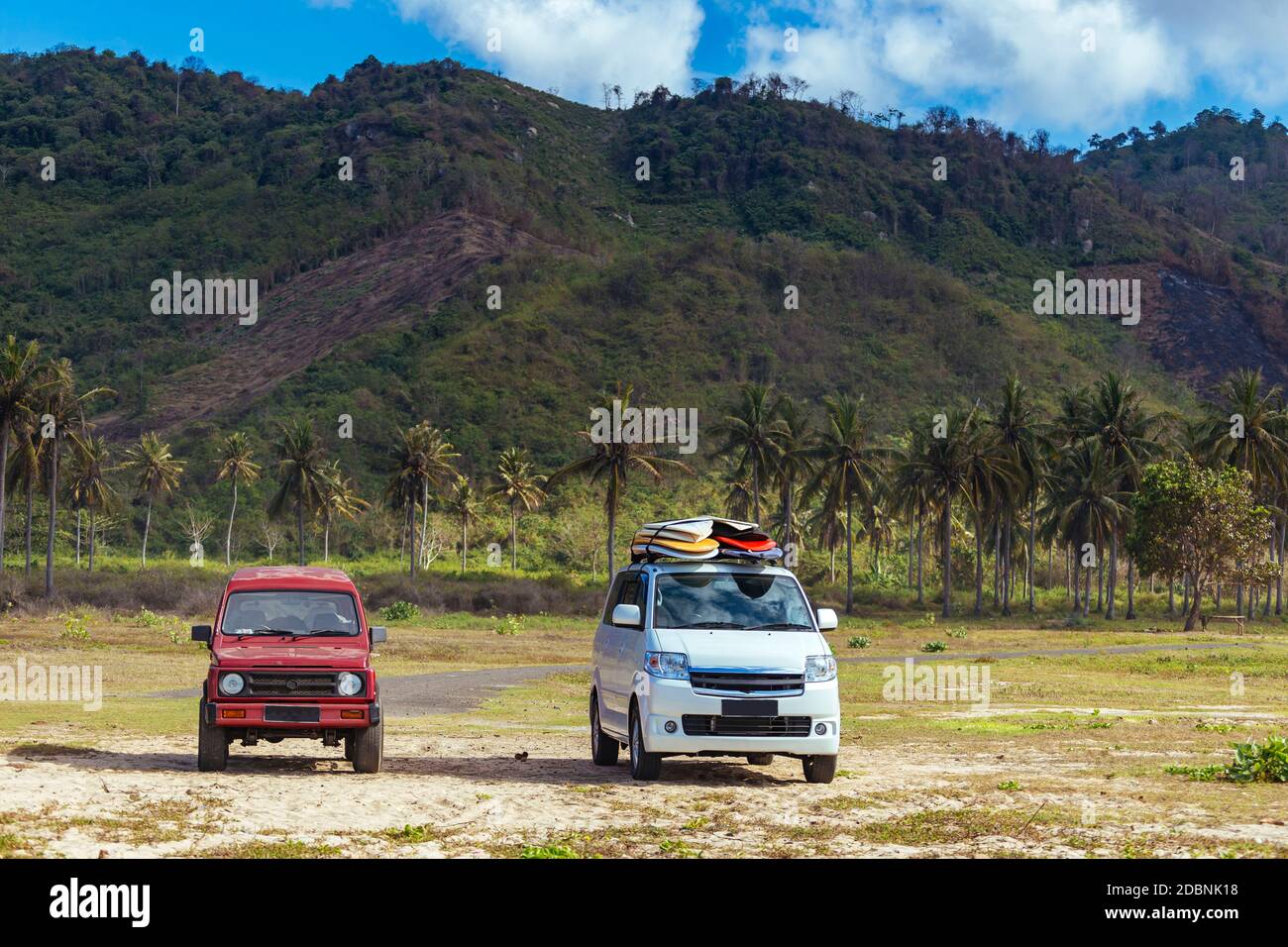 Two cars with surfboards, Lombok, Indonesia Stock Photo Alamy