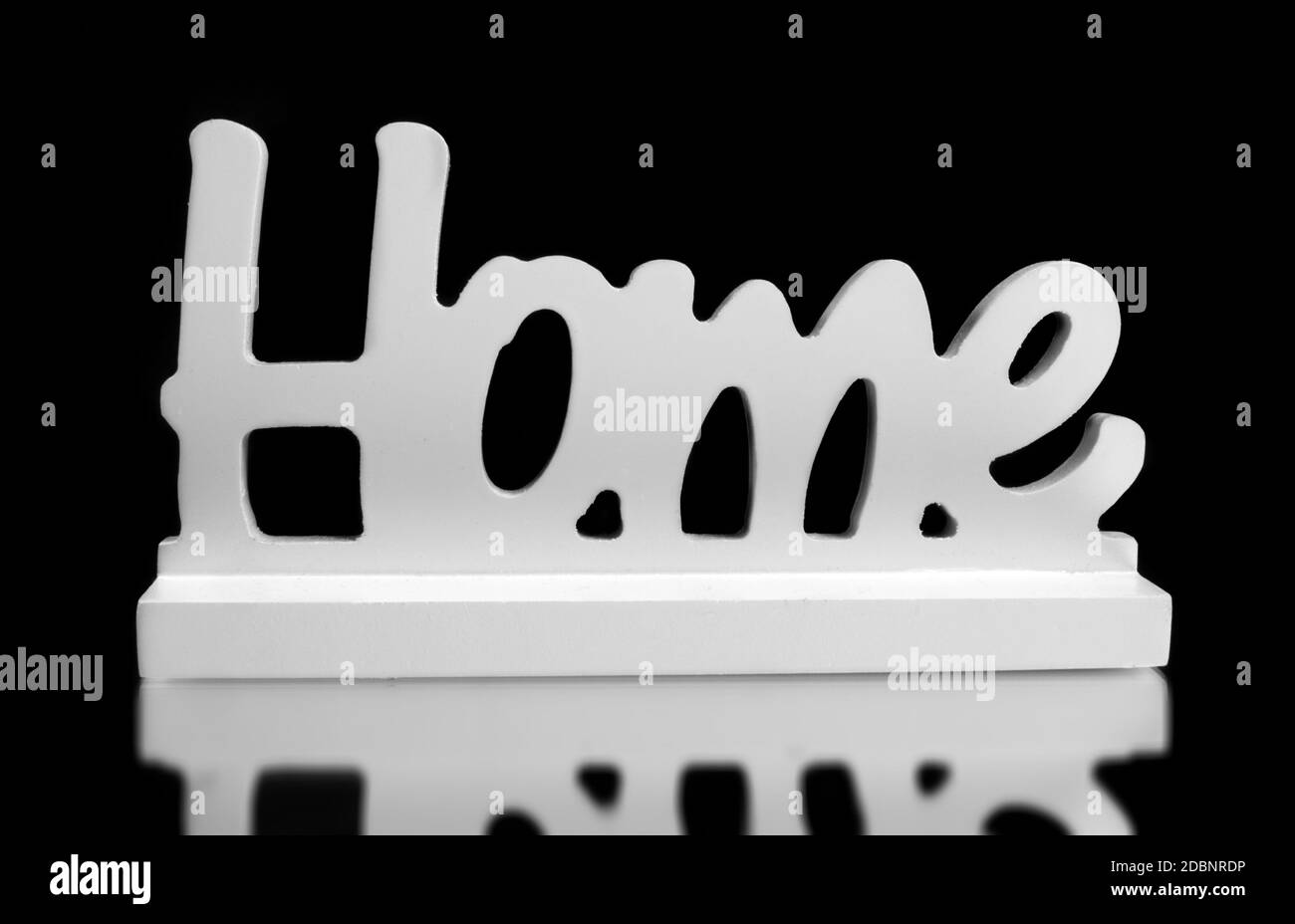 home sign on the black surface Stock Photo
