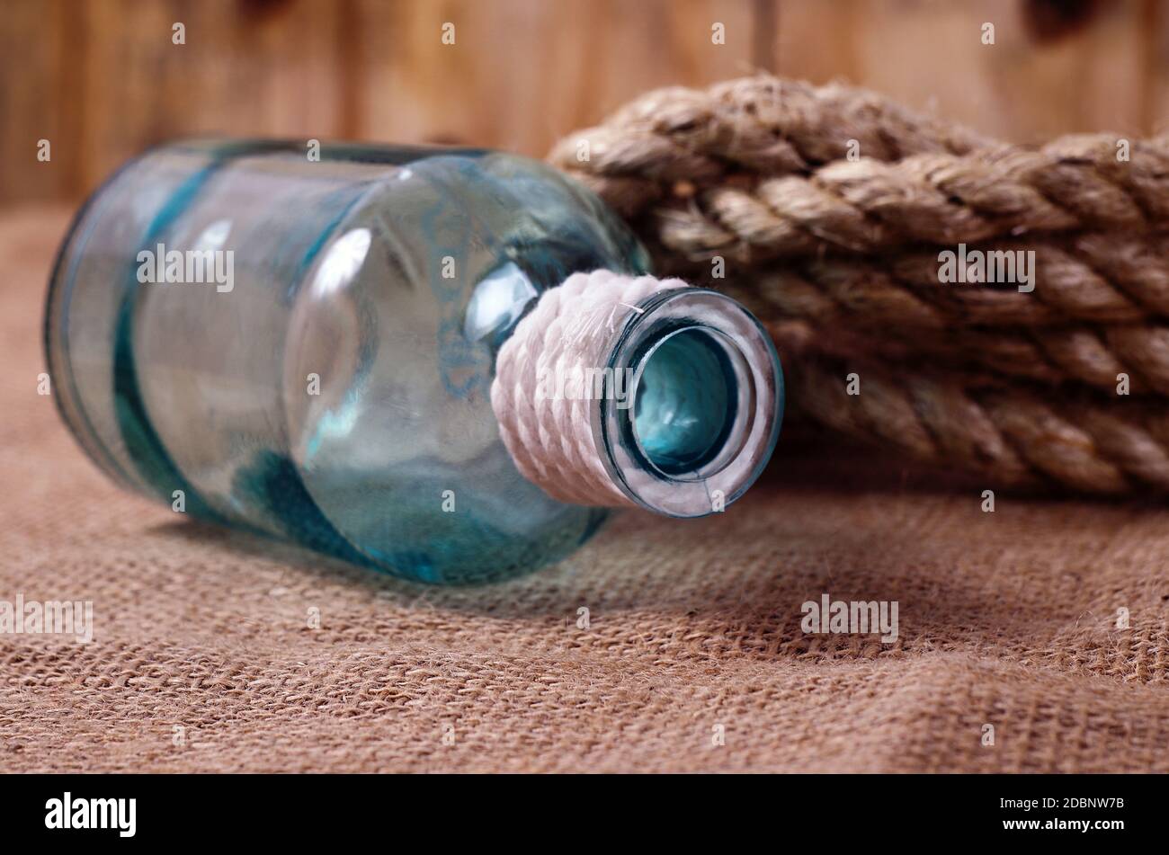 vintage objects,bottle and rope Stock Photo - Alamy