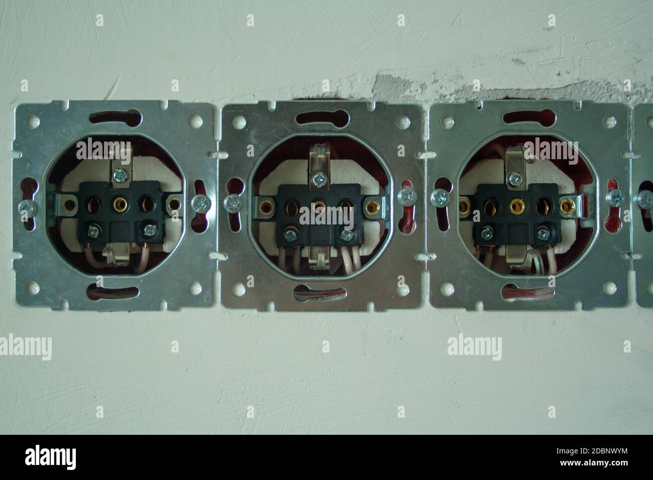 Disassembled power socket. Installation of the power socket Stock Photo