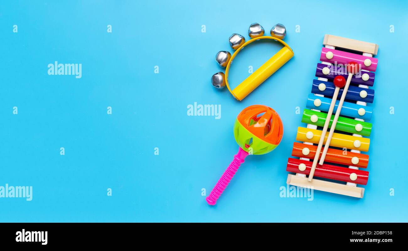 Hand bells musical instrument for ringing with colorful xylophone and