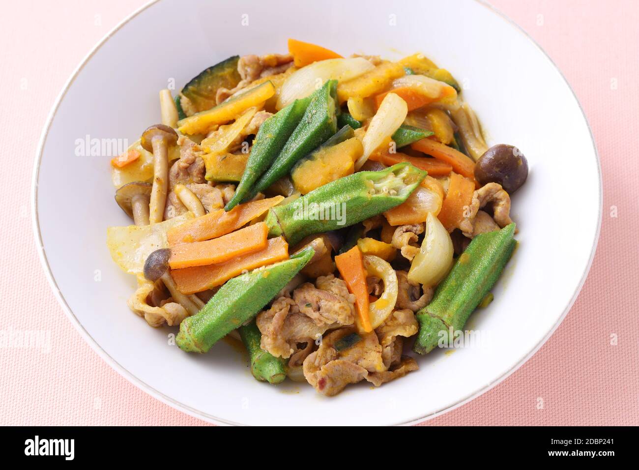 Vegetable stir fry in a plate on table. Close up Stock Photo