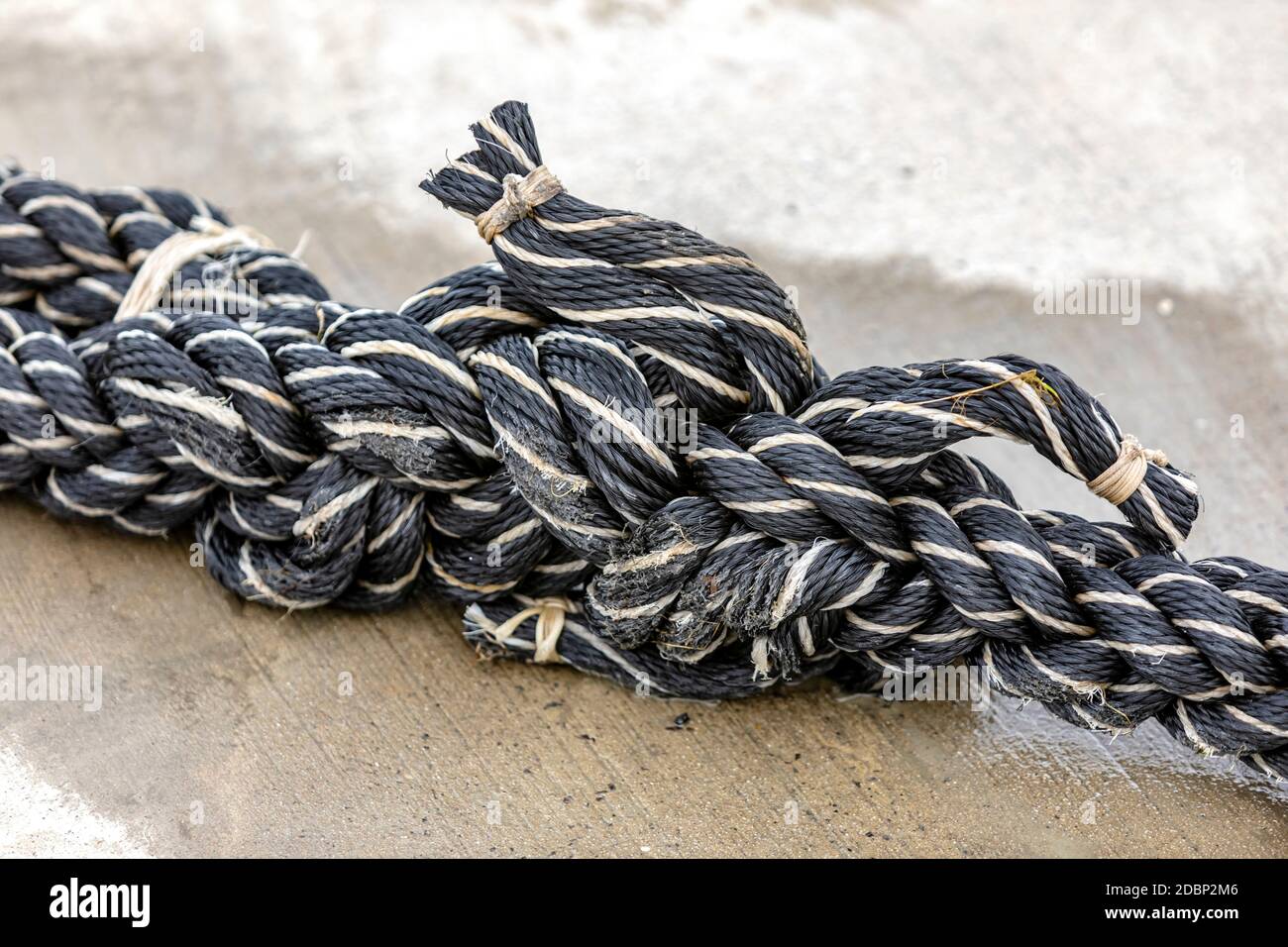 This splice secures the ship in the harbor Stock Photo
