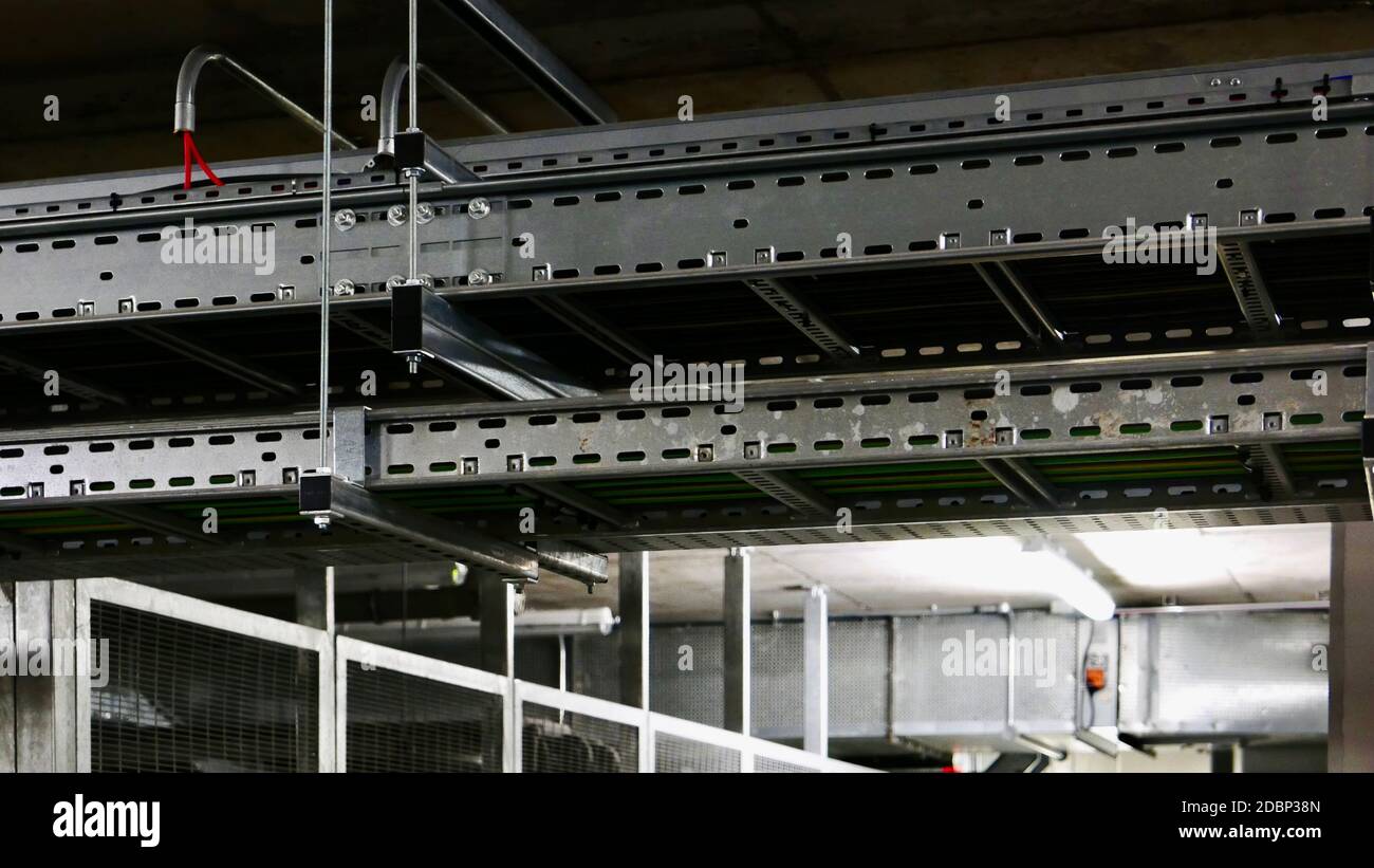 Metal overhead railing in an underground car park of a residential ...