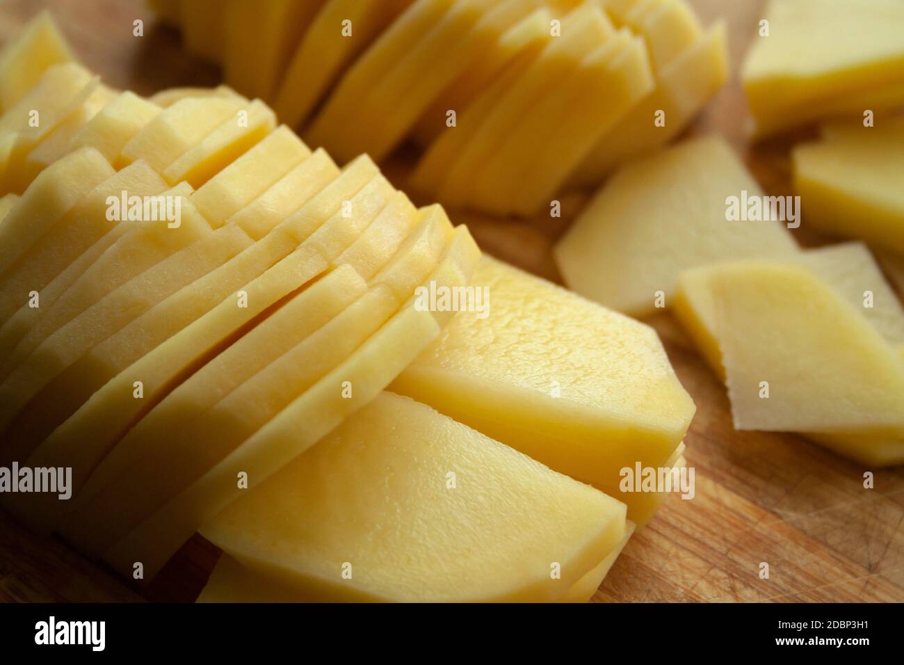 Heap of thin sliced potatoes close up Stock Photo