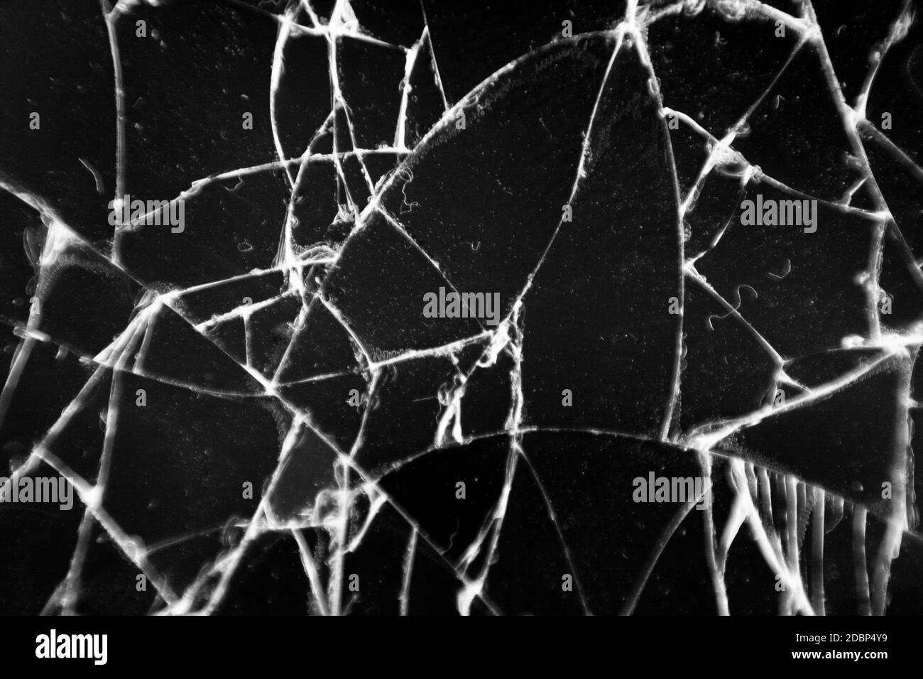 Broken glass texture. Abstract of cracked phone screen. Smartphone broken cracked glass texture of display screen. Abstract background Stock Photo