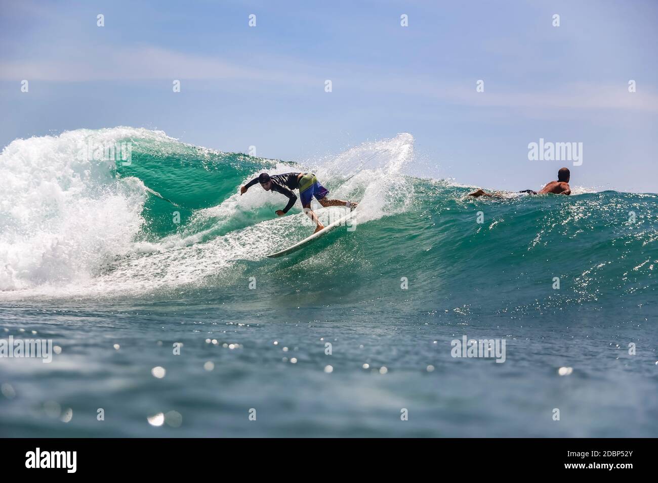 Surfer on wave,Ã‚Â Sumbawa, Indonesia Stock Photo