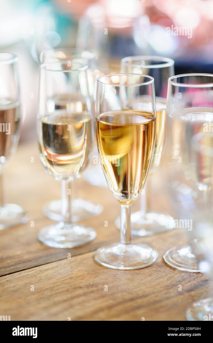 Holiday champagne and festive feeling, blurry bokeh background. Stock Photo