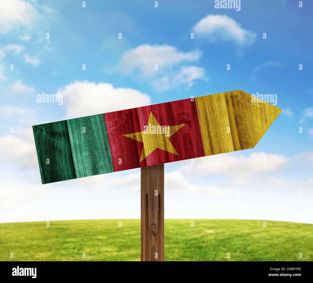 Cameroon wooden direction sign on nature background Stock Photo - Alamy