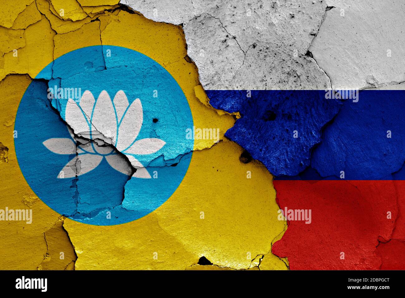 flags of Kalmykia and Russia painted on cracked wall Stock Photo