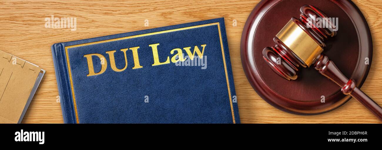 A gavel with a law book - DUI Law Stock Photo