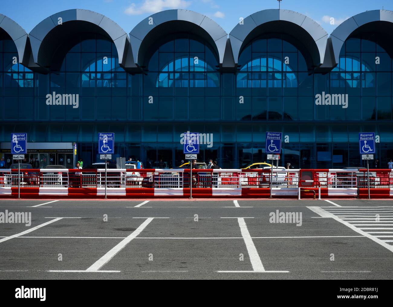 Otopeni, Romania - September 21, 2020: A Reserved Handicapped Parking Sign is seen in the parking of Bucharest Henri Coanda International Airport, i Stock Photo