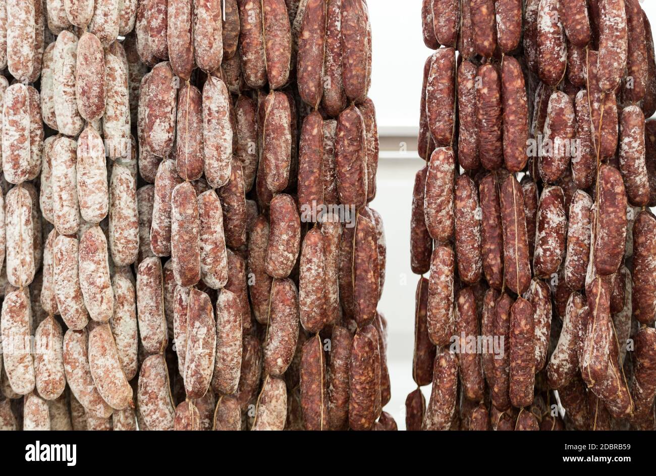 Italian different traditional sausages  at the store. Stock Photo