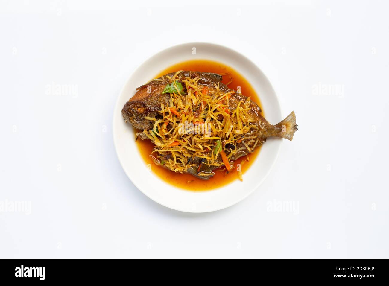 Deep fried fish with ginger and soy sauce on white dish plate. Top view Stock Photo Alamy