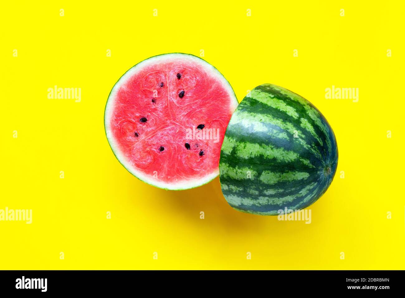 Fresh watermelon on yellow background. Top view Stock Photo - Alamy