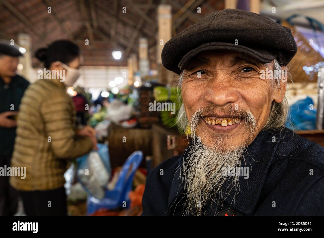 Old Man at the Local Market of Sa Pa in Vietnam Stock Photo