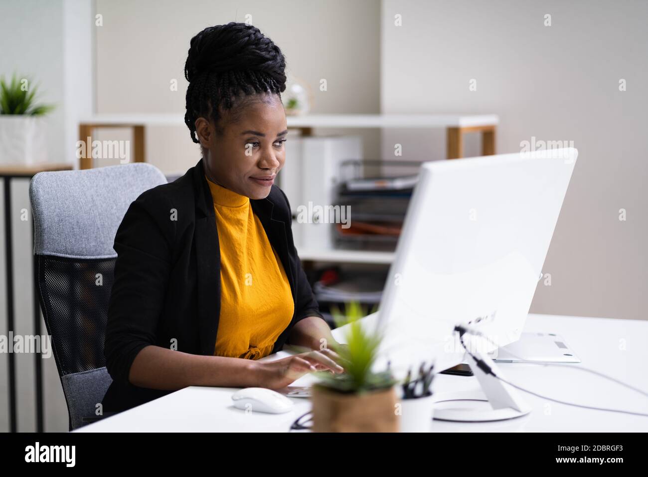 Happy Professional Woman Employee Using Computer For Work Stock Photo ...