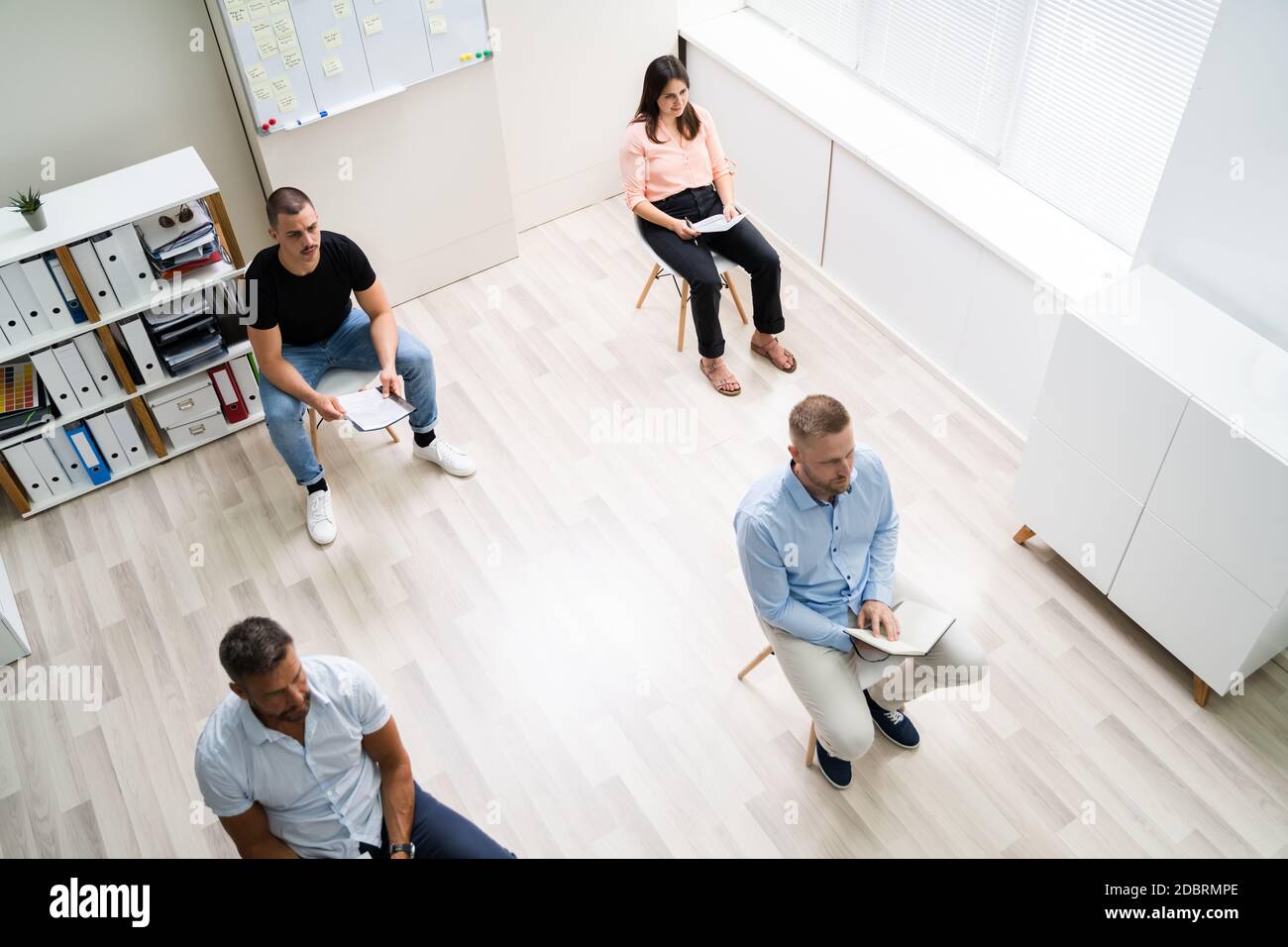 Business Team Meeting Or Presentation With Social Distancing Stock ...