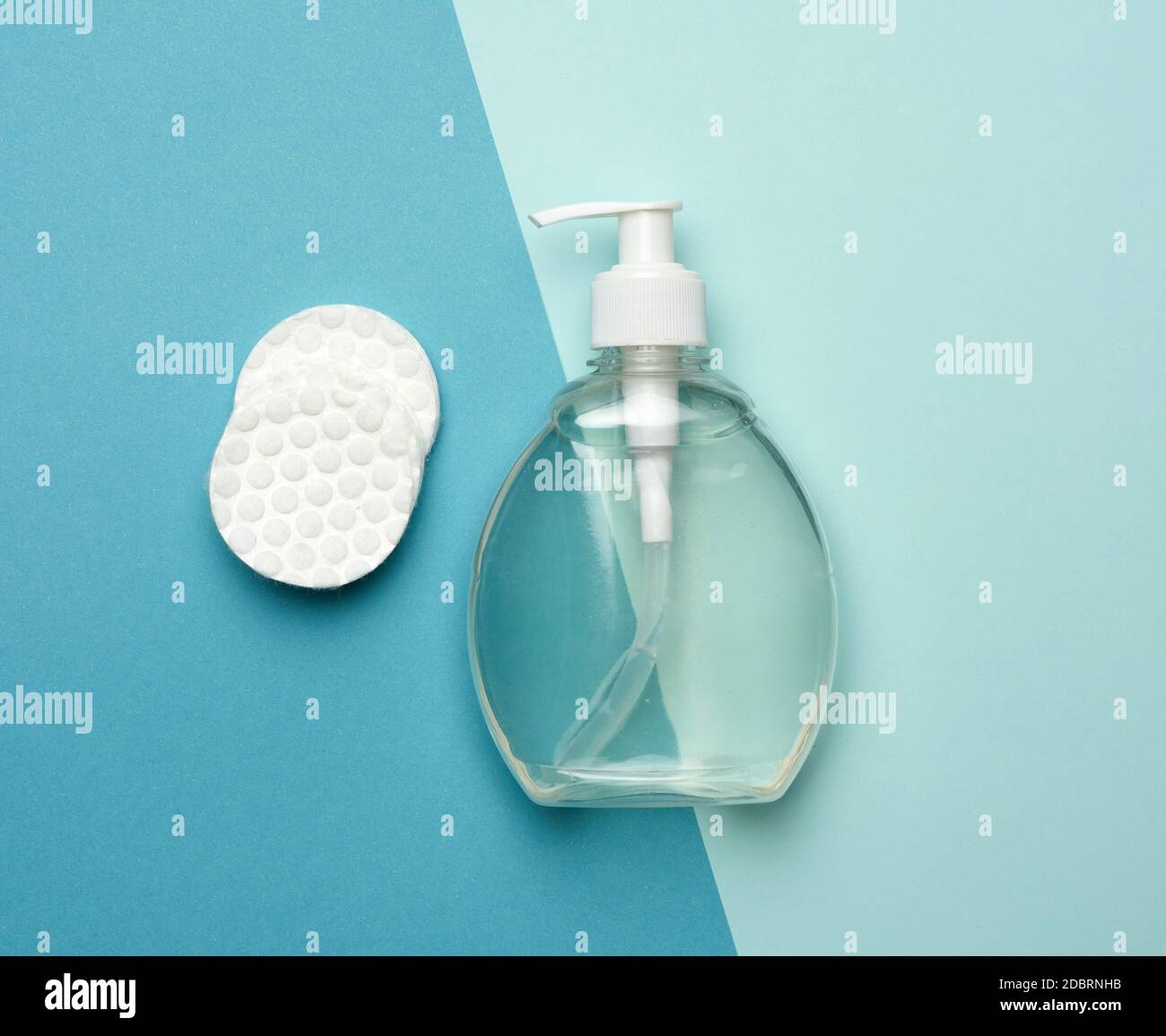 White Cotton Discs And A Clear Plastic Gel Bottle Disinfection Or Face