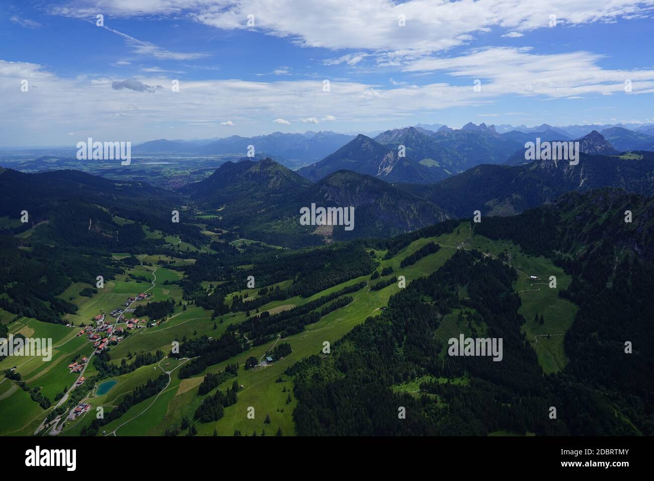 Aerial view of hilly landscape in the AllgÃ¤u. Stock Photo