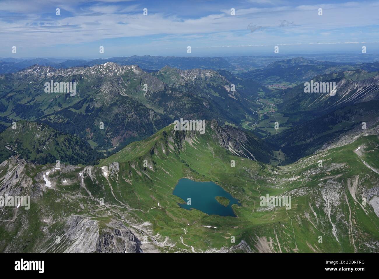 Aerial view of German mountain lake with the adjacent mountains from Austria Stock Photo