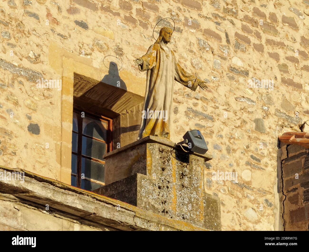 Statue on the facade of the Church of San Pedro on the Main Square (Plaza Mayor) - Belorado, Castile and León, Spain Stock Photo