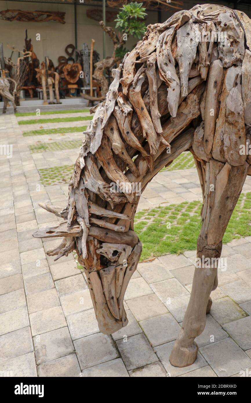 Wooden statue of a horse. Art and work of Balinese artists. Wooden art