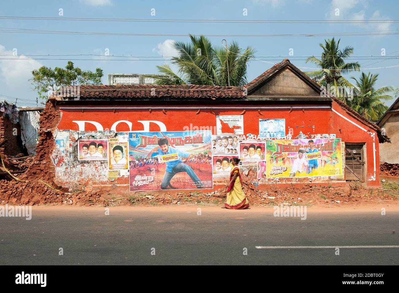 Tamil Nadu, India January 2016 Coloured posters on a red wall Stock