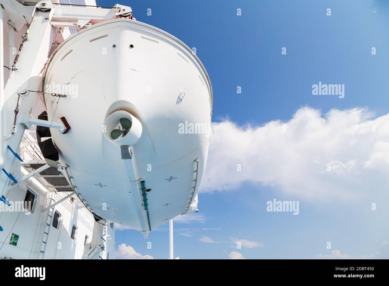 Cruise ship emergency safety rescue boat on deck Stock Photo