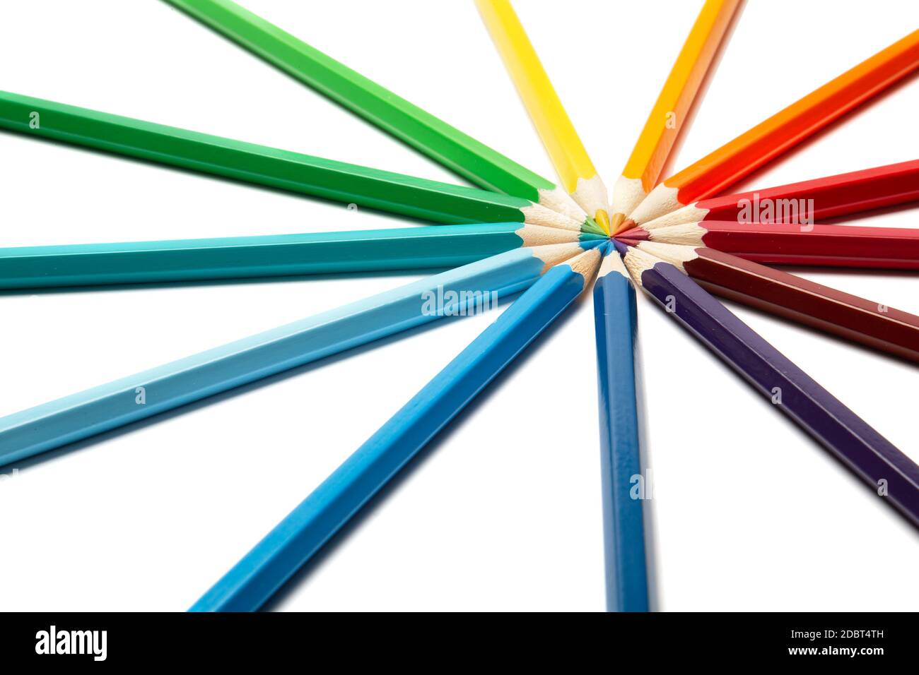 Lot of colorful wooden pencils on a white background Stock Photo