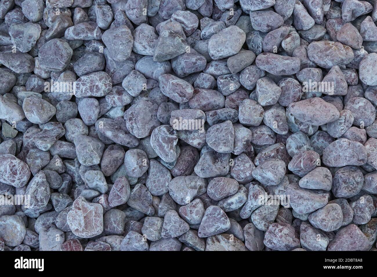 Decorative rounded stones for landscape design. Background Stock Photo ...