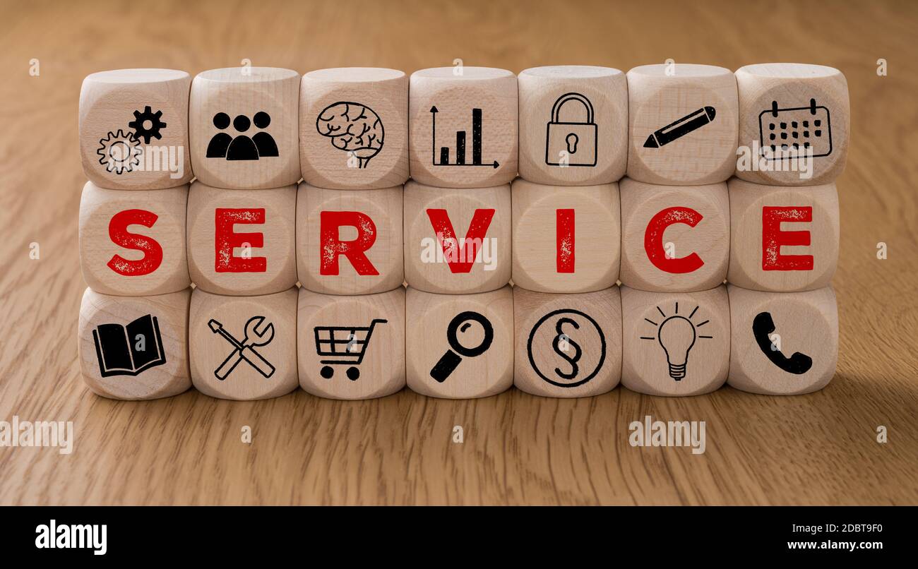 Dice with icons and the word Service Stock Photo - Alamy