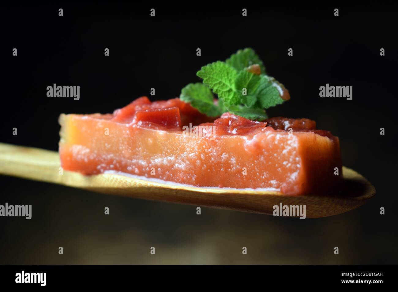 Slice of aspic with peaches Stock Photo