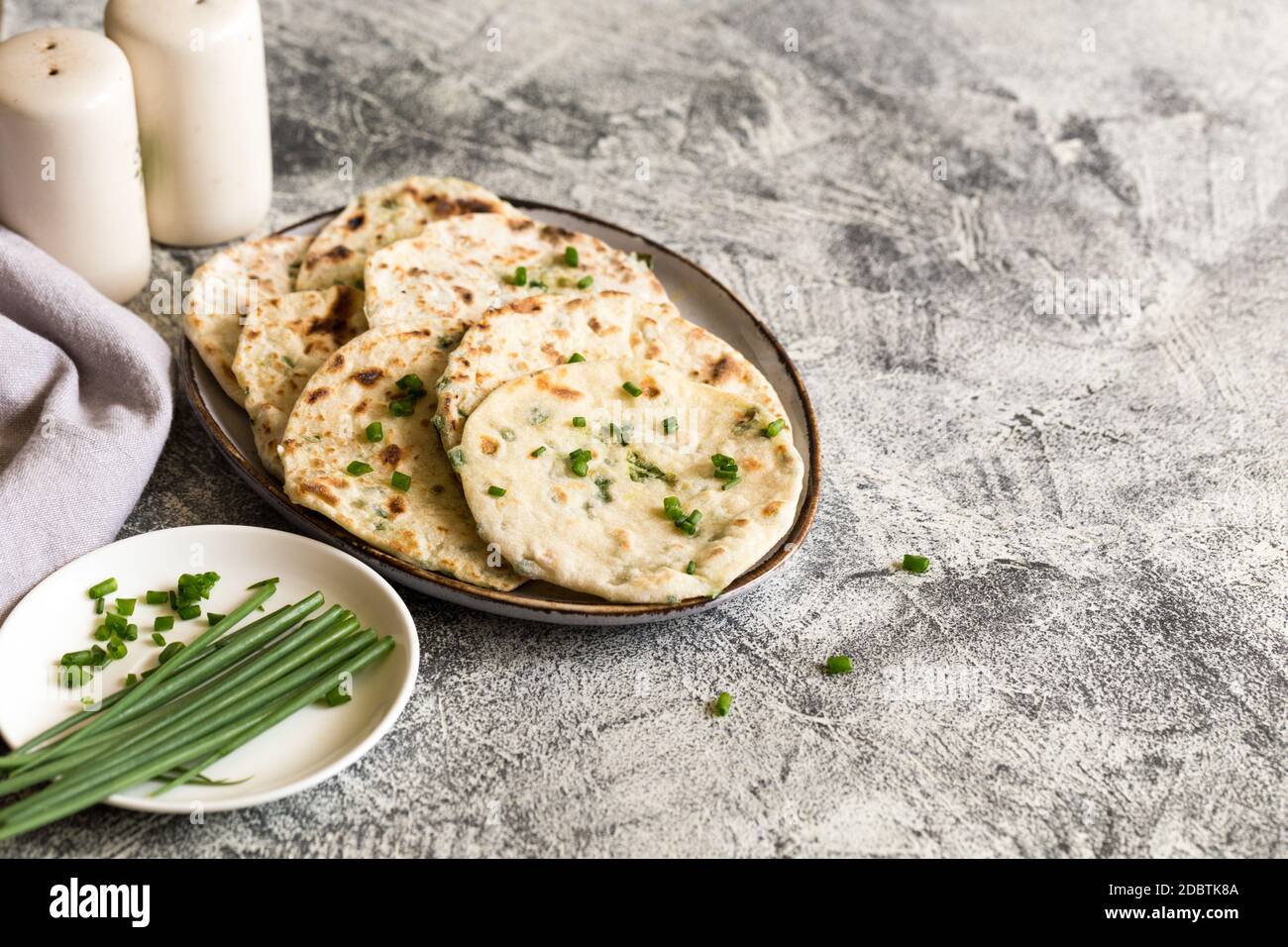 Onion naan traditional indian bread. pita bread or scones with green onions Stock Photo Alamy