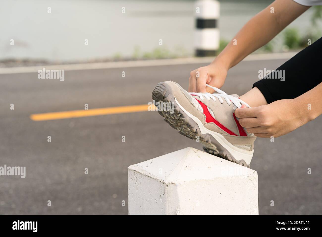 Streamlined Shoelace Routine Reference: Woman Runner Tying Shoelace His Before Starting Running Woman Doing