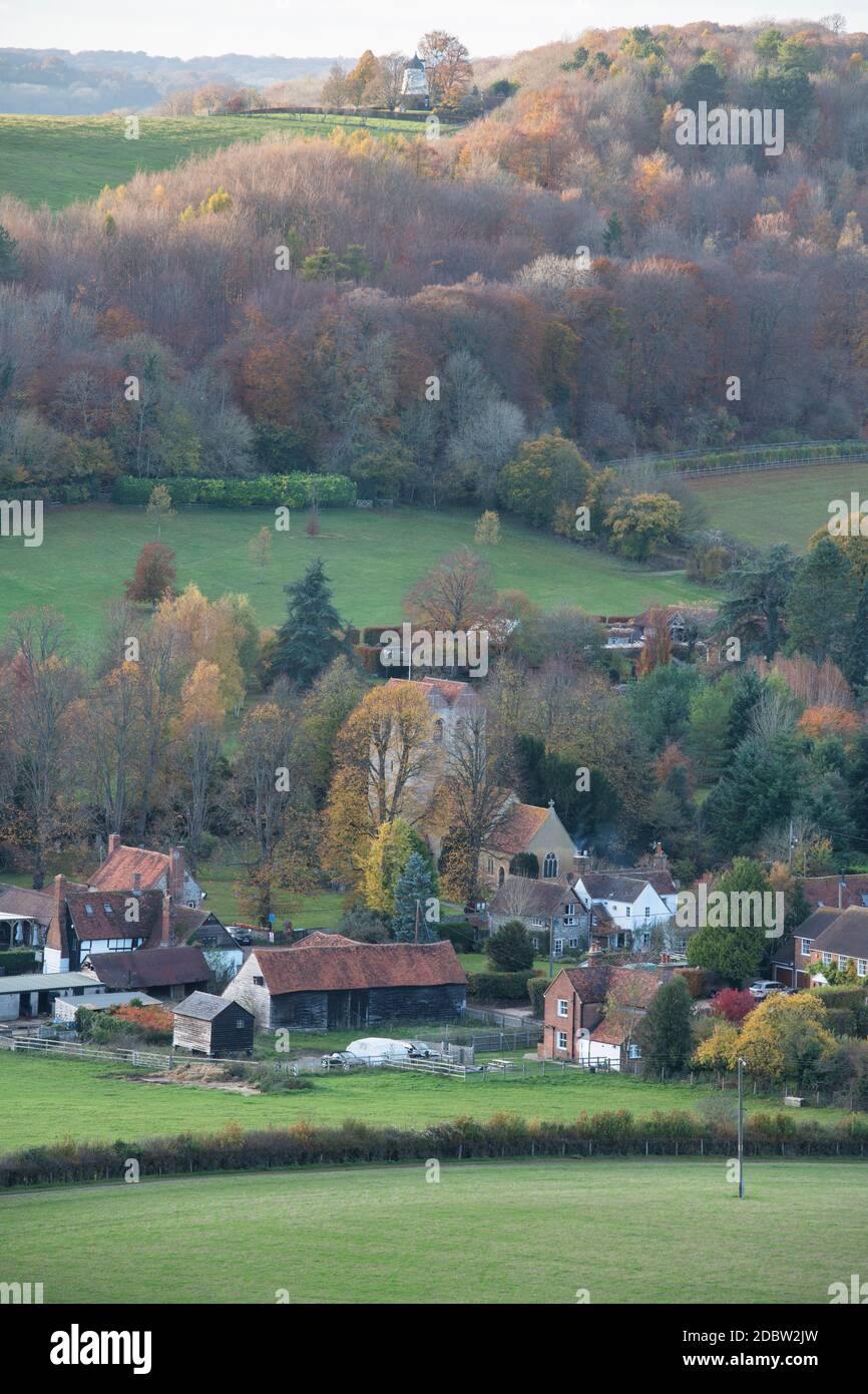 Late afternoon autumn sunlight looking over Fingest village in the