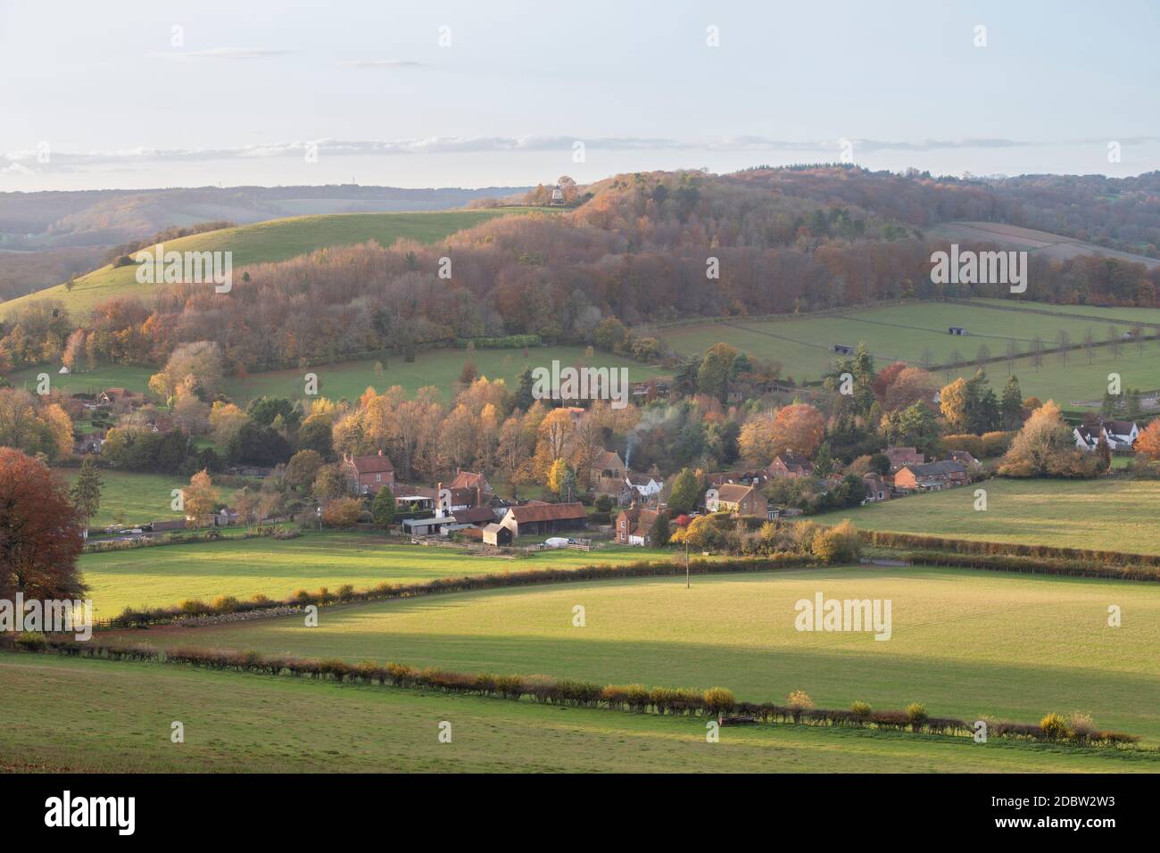 Late afternoon autumn sunlight looking over Fingest village in the