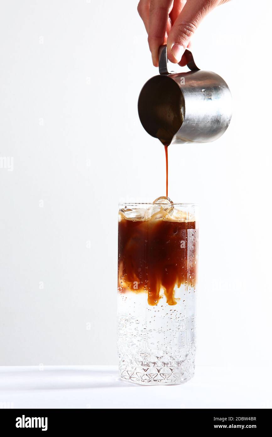 Soft drink based on coffee and mineral water. Coffee is poured into ice
