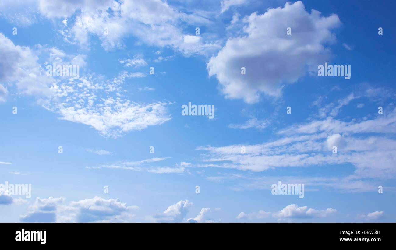 The beauty of blurred white clouds and blue skies as well as fresh air. Stock Photo