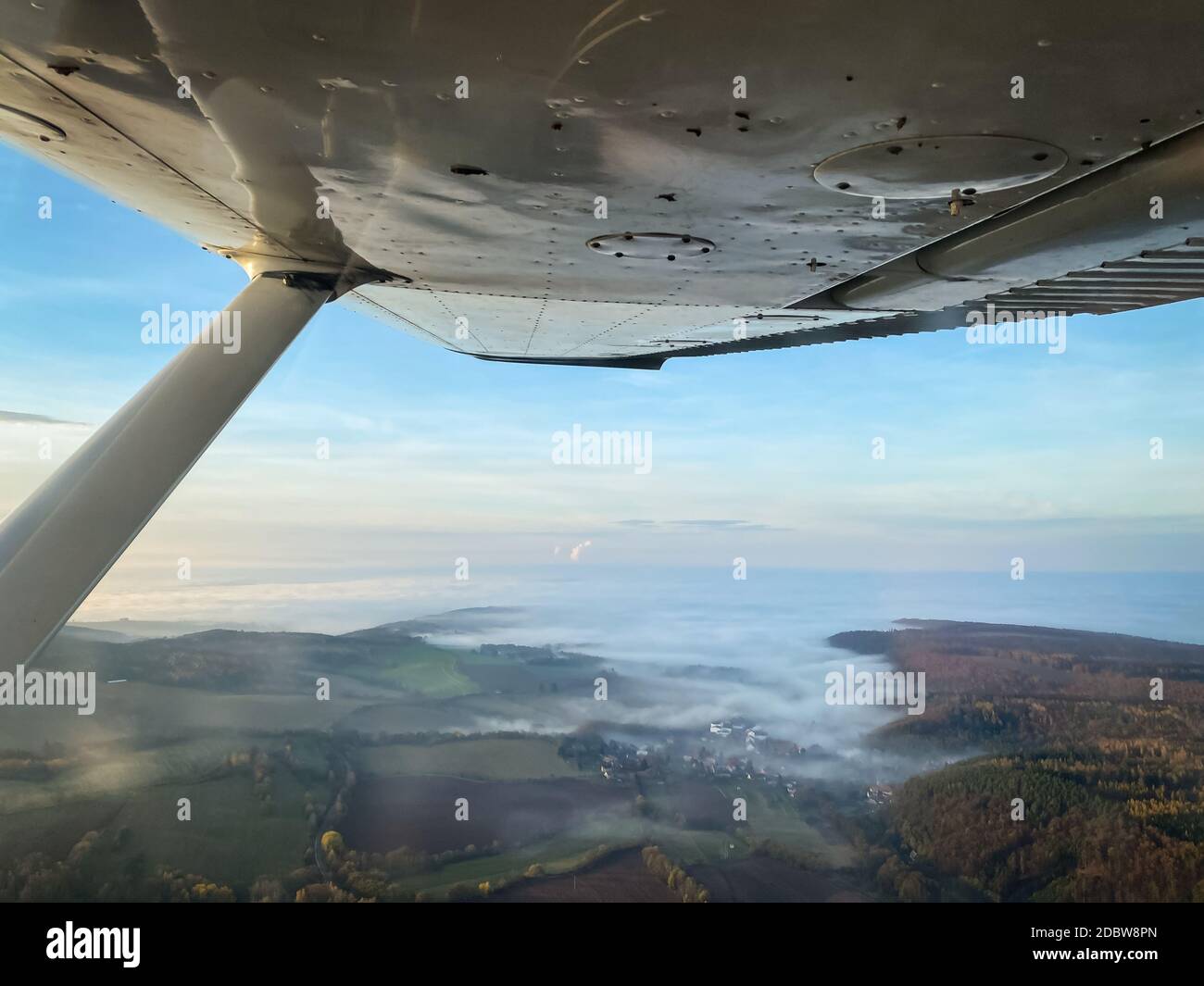 Beautiful aerial view of countryside during sunset from a Cessna Plane ...