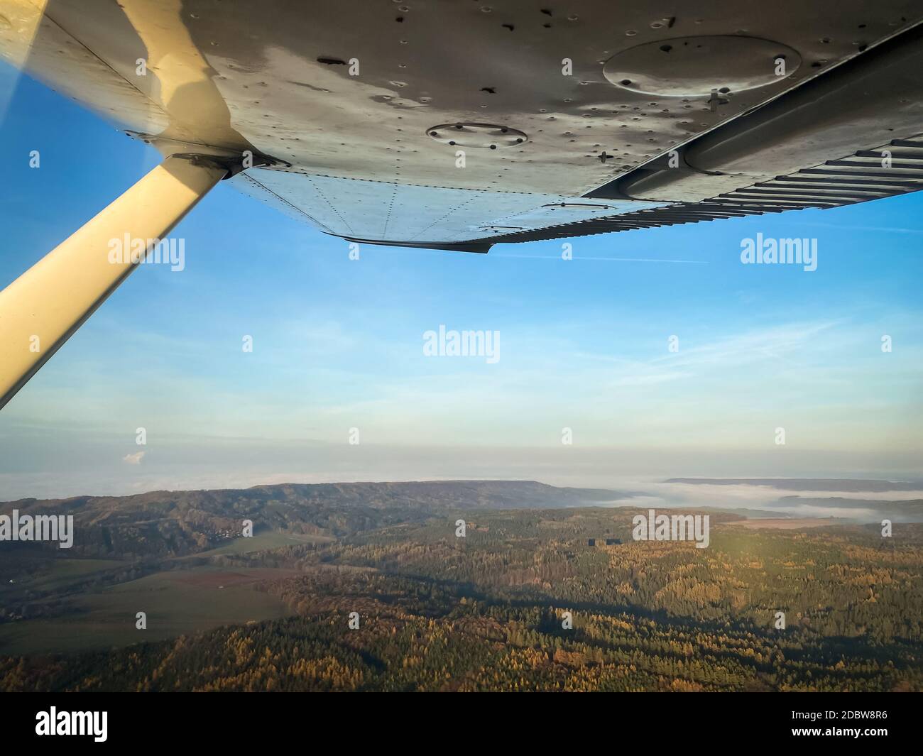 Beautiful aerial view of countryside during sunset from a Cessna Plane ...