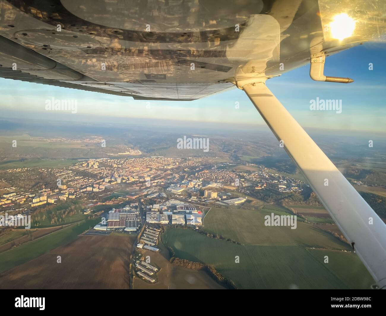Beautiful aerial view of countryside during sunset from a Cessna Plane ...