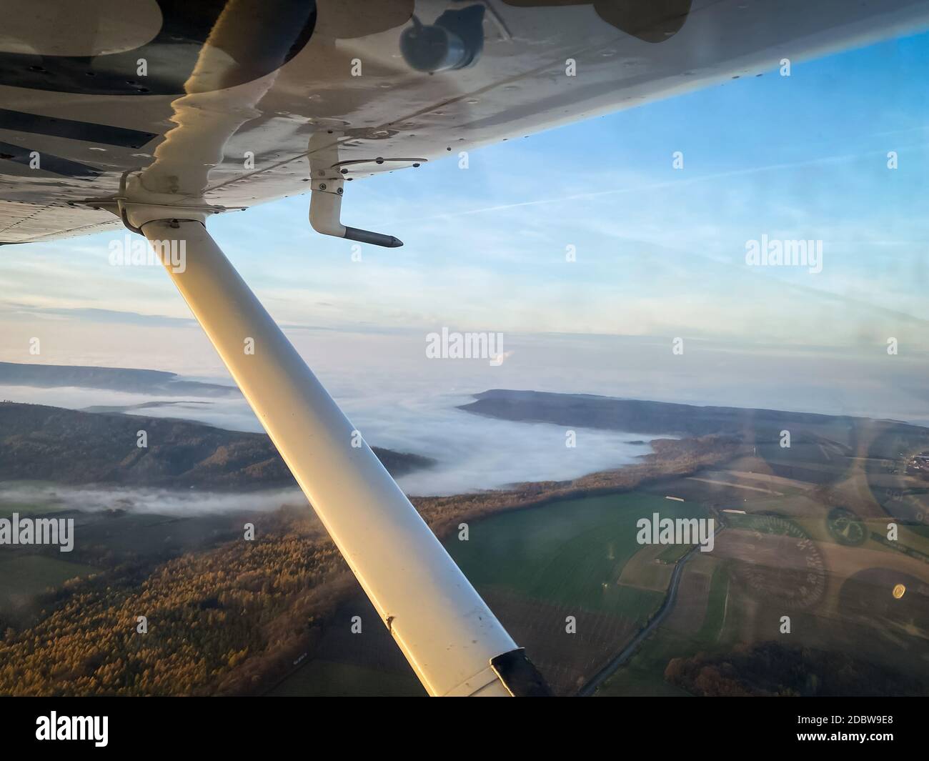 Beautiful aerial view of countryside during sunset from a Cessna Plane ...