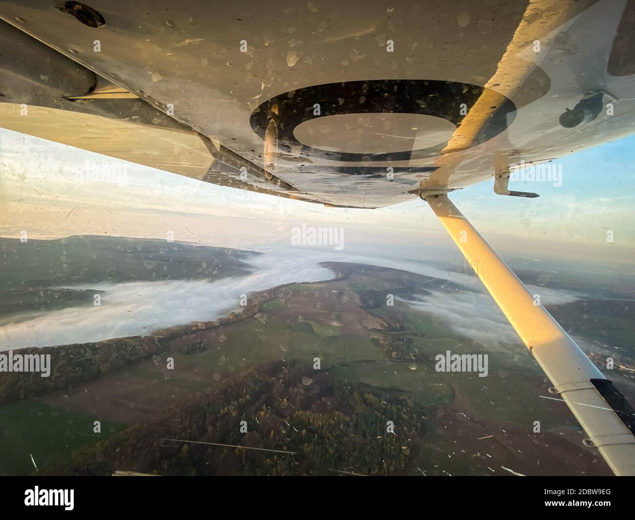 Beautiful aerial view of countryside during sunset from a Cessna Plane ...