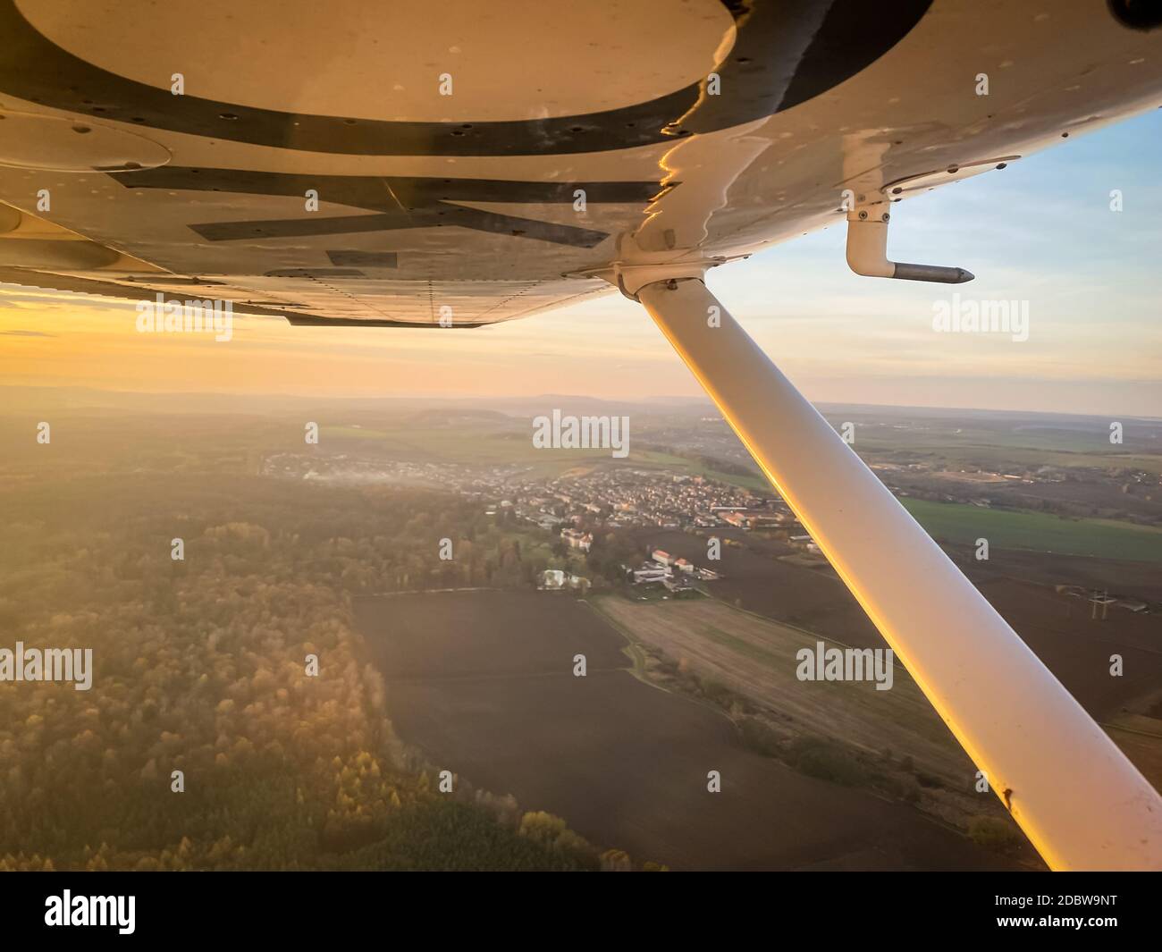 Beautiful aerial view of countryside during sunset from a Cessna Plane ...