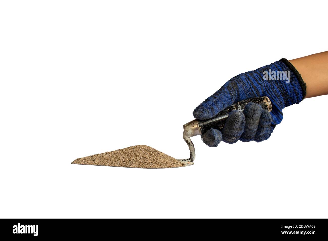 Sand for mixing cement on a plastering trowel, including the hands of a builder olated on white background with the clipping path. Stock Photo