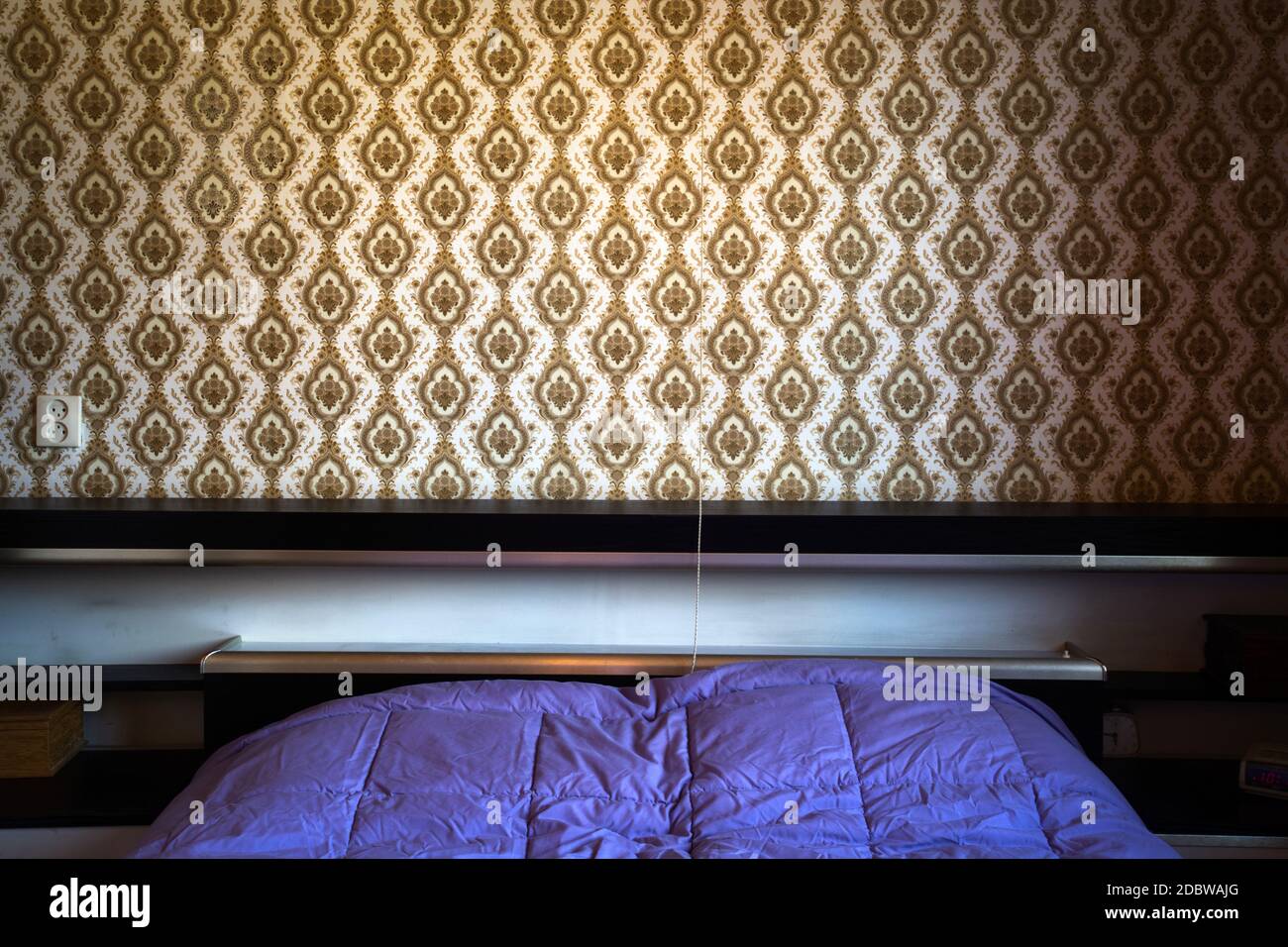 Retro vintage bedroom with pattern wallpaper, closeup wall elegant
