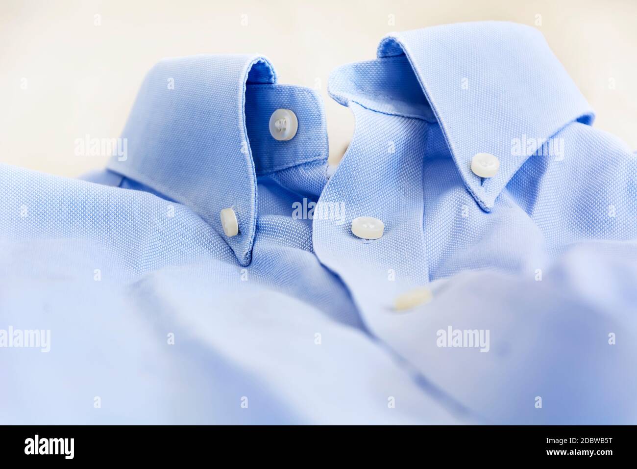 A light blue shirt with a button down 