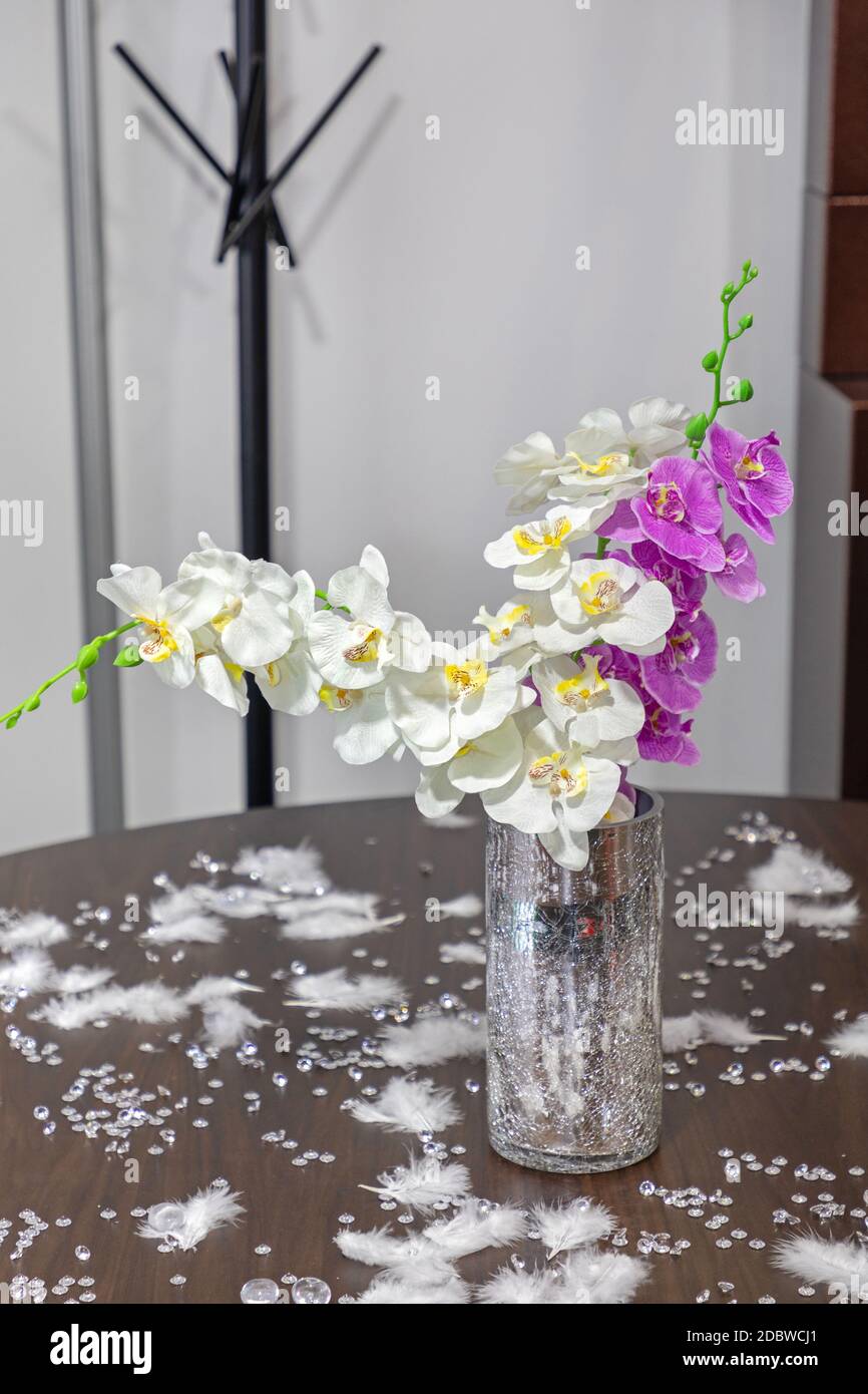 Artificial Orchids in Silver Vase at Festive Table Stock Photo Alamy