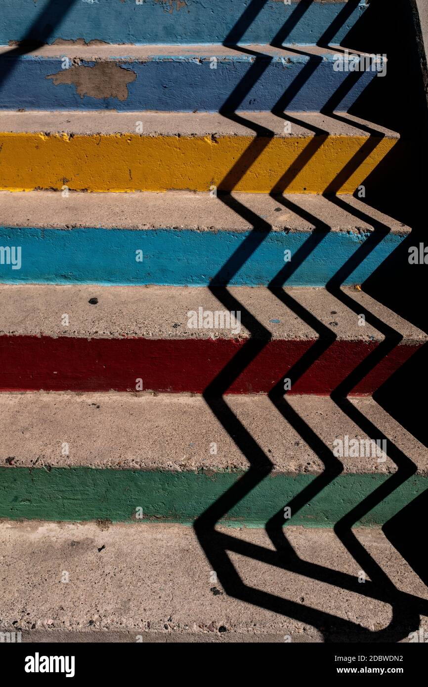 pastel colored concrete stairs with shadows Stock Photo